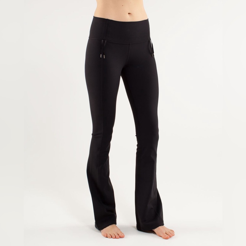 Women’s lululemon size 4 recognition pant with hot pink waistband